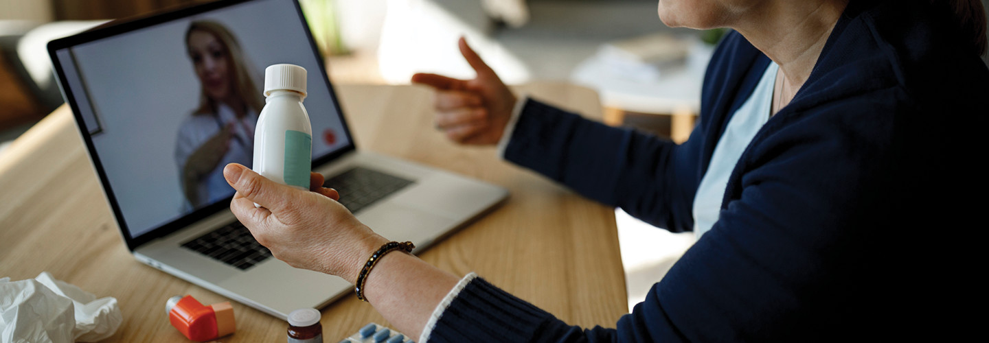 woman consults a doctor through a virtual visit