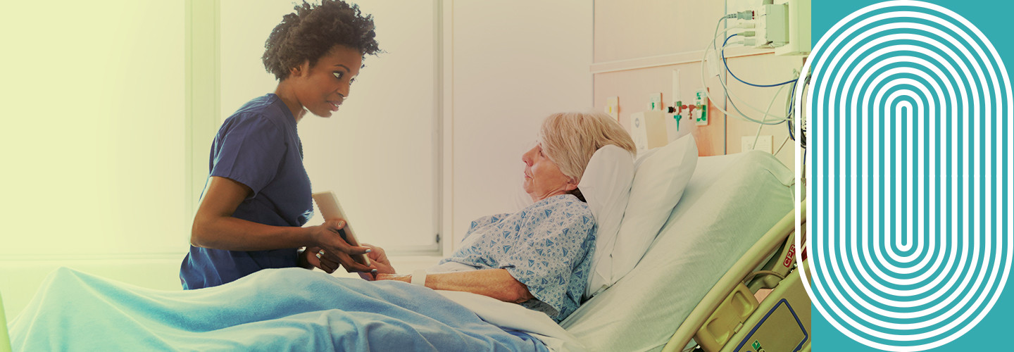 Nurse helping patient with device