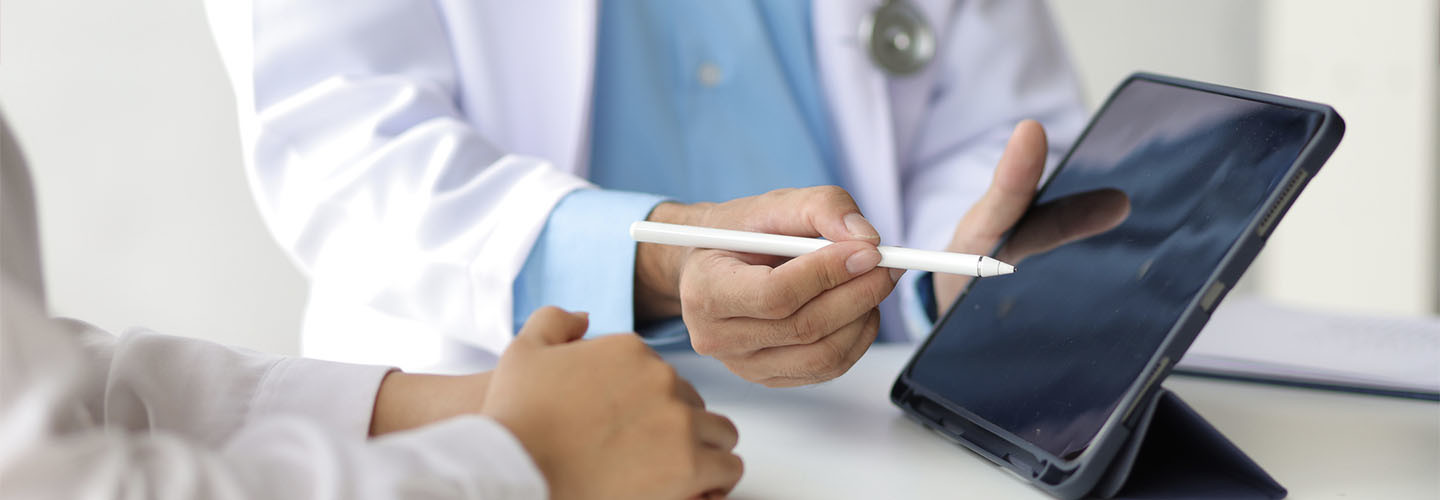 Doctor using tablet