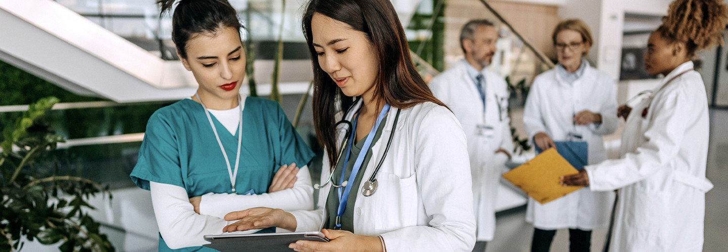 Doctors speaking in hospital